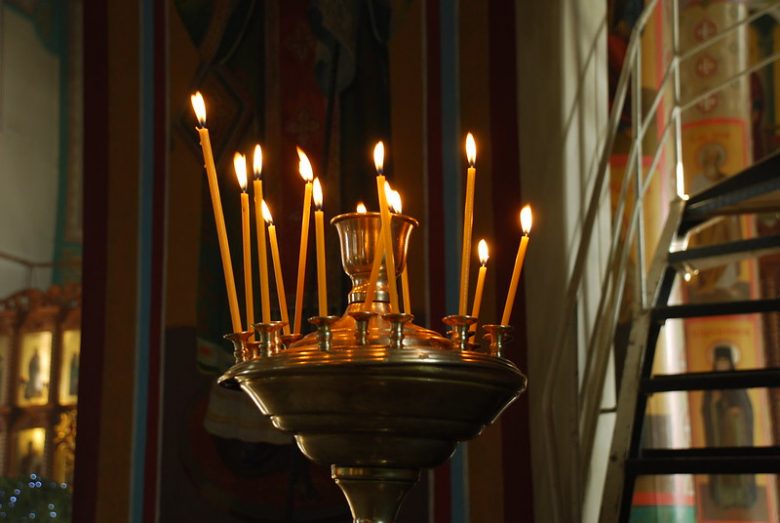 burning candles in church